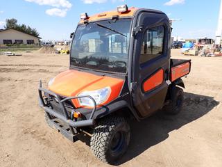2015 Kubota RTV-X110C Utility Vehicle c/w Kubota 1.1L 3-Cyl Diesel Engine, 58 In. X 40 In. X 12 In. Dump Box, A/C & Heated Cab And 25X10.00-12NHS Tires. Showing 13,673kms. VIN A5KC2GDBTFG019622 *Note: Panel Missing On Passenger Door*