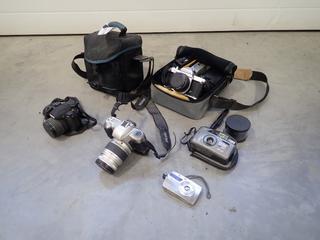 (4) Pentax Cameras c/w Lenses, Filters, Vivtar Big View BV35DB Camera, Olympus Stylus 710 Camera *Note: Working Condition Unknown, This Item Is Located Offsite In Alberta Beach, For More Info Contact Richard @780-222-8309**