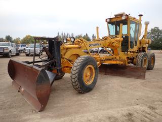 1984 Champion 740 Motor Grader c/w A/C Cab, Cummins M11 Engine, 9 Ft. Push Blade, 14 Ft. Mold Board, Snow Wing Frame And 14.00R24 Tires. Showing 1524hrs. SN 740-23-363-15609 *Note: Brakes Not Working, Require Repair*