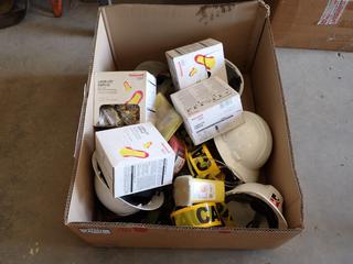 Box of Assorted Hard Hats, Caution Tape and Ear Plugs.