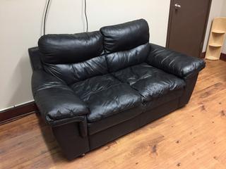 Leather/Vinyl Loveseat, 70in x 37in x 34in.  *Note - Buyer Responsible for Dismantling and Removal* 