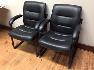 (2) Leather Arm Chairs. (AUD)