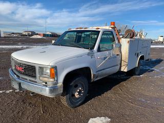 1999 GMC 3500 SL Service Truck c/w 5.7 V8, Auto, Reading 108GBDW Service Body, DeWalt Air Compressor, 25ft Hose Reel, Reid 767 Boost Pac, DC to AC Electric Generator, Oxy/Acet. Torch Gauges and Hose, Showing 110542 Kms, 2424 Hours, VIN 1GDHC34R1XF060408. *Note: No Heater Module, Driver Door Trim Panel Removed, Boost Pac Requires Repair (12V Only).