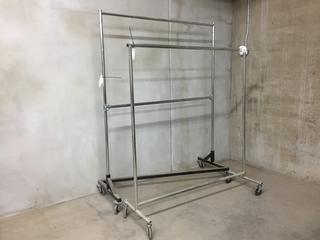 (2) Rolling Clothing Racks and Assorted Hangers. (WH)