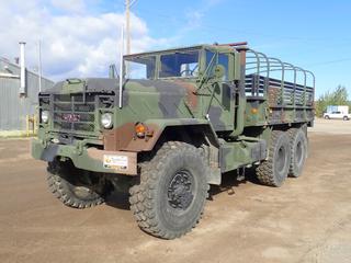 1992 BMY Div Of Harsco Model M923A2 5-Ton 6X6 Cargo Truck c/w Cummins 6CTA 8.3L 6-Cyl Diesel, Allison 5-Spd A/T, 14ft X 7 1/2ft Truck Box, Canvas Cover, 180in W/B And 16.00R20 Tires. Showing 10,115hrs, 66,424 Miles. VIN 2307792 **LOCATED IN HINTON, AB**