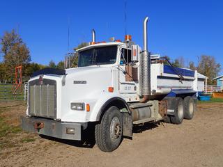 1989 Kenworth T800 T/A Dump Truck c/w CAT 3406 4 1/2hp , Eaton Fuller 8LL Manual Transmission, Positive Air Shut Off, 25,401kg GVWR, 5443kg Fronts, 9979kg Rears, 15ft X 8ft Dump Box, 204in W/B, 315/80R22.5 Front And 11R24.5 Rear Tires. CVIP 08/2024. Showing 0293hrs, 570,757kms. VIN 2XKDDB9X6KM921473 *Note: Transmission Grinds When Shifting Into Overdrive, Works Good*