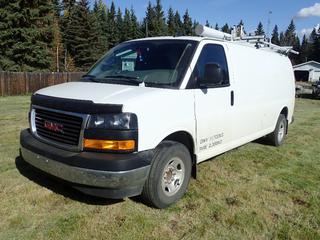 2021 GMC Savana Cargo Van c/w 6.6L V8 Vortec, 9900lb GVWR, 4300lb Fronts, 6084lb Rears, Backup Camera, Ergo Rack Storage Rack, Ranger Design Shelving And Storage Cabinets, Carmanah Go Power Model GP-ISW2000 2000W Pure Sine Wave Inverter, LED Light Bars And LT245/75R16 Tires. Showing 45,317kms, 593hrs. VIN 1GTZ7HF72M1176490 *Note: ABS And Service Traction Control Lights On, Windshield Cracked*