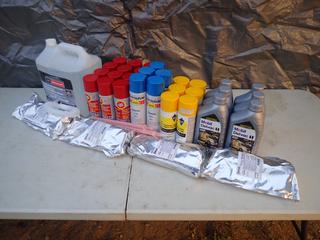 Qty Of (6) 1L Jugs Of Mobil Delvac 0W-40 Oil c/w Ford 9.46L Def Fluid, (5) Rust-Oleum Enamel Blue Spray Paint, (12) Fluid Film Rust And Corrosion Lubricant, (4) Devcon Rubber Repair Liquid And (6) Tough Guy OSHA Safety Yellow Multi-Purpose Spray Paint *Unopened And Unused*