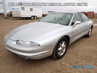 Fort Saskatchewan Location -  1999 Oldsmobile Aurora 4-Door Sedan c/w 4L, A/T, Fully Loaded, Power Sunroof And 235/60R16 Tires, Showing 168,893 Kms. VIN 1G3GR62C1X4105499 *Note: Crack In Windshield, Service Engine Light On, ABS Light On*