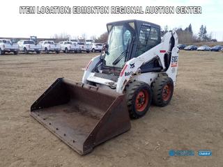 Fort Saskatchewan Location - 2003 Bobcat S185 Skid Steer Loader c/w Kubota V200-T-E 2.0L Engine, Aux Hyd, Q/A, H-Drive Steering w/ Foot/Hand Bucket Controls And 6 Ft. Bucket. Showing 7344hrs. PIN 519037576 *Note: Has Steering Issues, Requires Steering Alignment As Per Owner*