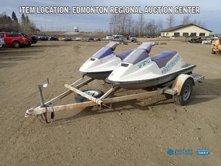 Fort Saskatchewan Location - (2) Bombardier Sea-Doo Personal Watercrafts w/ Bombardier Rotax 580cc Gas Engines, SN ZZN04900C292, SN ZZN04892C292 c/w 13 Ft. S/A Trailer w/ 2 In. Ball Hitch And ST175/80R13 Tires. *Note: Running Condition Unknown, Unable To Verify Trailer VIN, Unable To Verify Sea Doo Years*