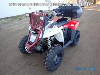 Fort Saskatchewan Location - 2011 Polaris Scrambler 500. H.D, AWD ATV, c/w Champion 3000 Lbs Winch, Storage Box, 25X8-12 Front Tires, 24X11-10 Rear Tires. VIN 4XANG50A8BA334658  *Note: New Battery As Per Consignor*