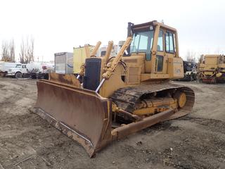 Located Offsite Near Winterburn - 1990 John Deere 750B Long Track Crawler Dozer c/w Enclosed CAB, 34 In. Single Grouser Pads And 11 Ft. Blade. Showing 12,591hrs. SN T0750BH771897 **Located Offsite at 21220-107 Avenue NW, Edmonton, For More Information Contact Richard at 780-222-8309**