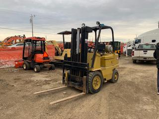 Located Offsite Near Winterburn - 2000 Caterpillar GP50K Forklift C/w 3 Stage Mast, 48 In Forks, Pneumatic Tires Showing 5999hrs. SN 11044 **Located Offsite at 21220-107 Avenue NW, Edmonton, For More Information Contact Richard at 780-222-8309**