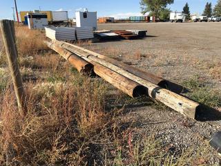 (4) Wooden Power Poles - Ranging From 22 ft. to 29 ft. Length.