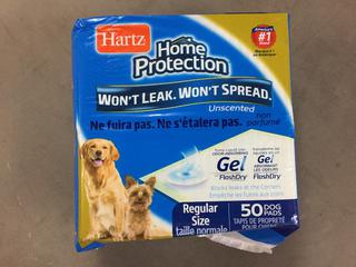 Quantity of Hartz Pro Pads and Dog Toys. (WH)