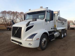 2019 Volvo VNR T/A Dump Truck c/w Volvo D11M-325 10.8L 325hp Diesel Engine, Volvo AT2612F 12-Spd A/T, Apsco AV-195 PTO, Webasto Preheat, 54,600lb GVWR, 14,600lb Fronts, 20,000lb Rears, Bibeau BFL-S 15ft Dump Box, Electric Roll-Over Tarp, 184in W/B, 315/80R22.5 Front And 11R22.5 Rear Tires. CVIP 03/2024. Showing 4965hrs, 146,093kms. VIN 4V5WC9DF3KN208027 *Note: Dent In Fuel Tank *Transferable Volvo Warranty And Work Orders, Please See Documents Tab For More Information* 