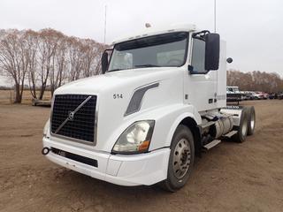2015 Volvo VNL64T300 T/A Truck Tractor c/w D16J550 550hp 16.1L Diesel, ATO3112D 12-Spd A/T, 59,200lb GVWR, 13,200lb Fronts, 23,000lb Rears, Summit PTO, Magnum Aluminum Headache Rack, Adjustable Fifth Wheel Hitch, 192in W/B And 11R24.5 Tires. Showing 198,388kms. VIN 4V4NC9KK7FN189360