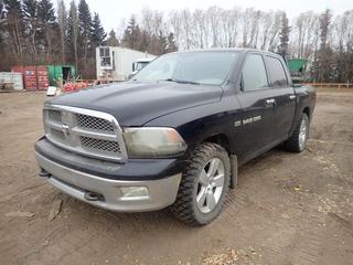 2012 Ram 1500 SLT Crew Cab 4X4 Pickup c/w Hemi 5.7L, A/T, Headache Rack And 33 X 12.50 R20LT Tires. Showing 248,770kms. VIN 1C6RD7LT5CS307710 *Note: Motor Requires Repair, Windshield Cracked, Dent On Tailgate, Minor Dent On Side, Rust, Mirror Missing And Passenger Side Mirror Cracked, Running Condition Unknown*