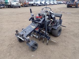 ABI Force Command Series Zero Turn Stand On Ground Prep Machine c/w Vanguard 18hp Engine, 66in Bunker Rake And Hydraulic Adjustable System. Showing 164.9hrs. SN A105779