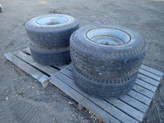 Qty of (4) Goodyear Custom Hi-Miler 12-16.5LT Foam Filled Tires w/ 8 Stud Rim *Note: Chunk Removed From (1) Tire*