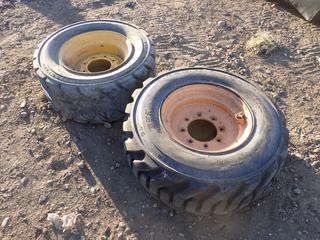 (2) Galaxy 12X16.5 Skid Steer Tires w/ 8-Bolt Rims