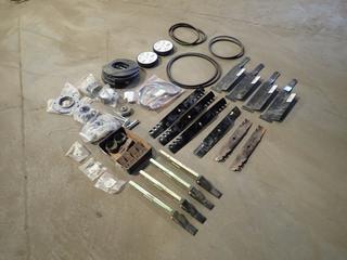 Qty Of Bobcat Guards, Wheels, Teeth, Belts, Filters And Mower Parts 