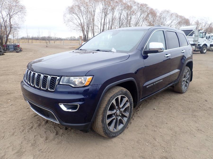 2018 Jeep Grand Cherokee Limited 4X4 SUV c/w 3.6L, A/T, Sunroof, Backup Camera And 255/50R20 Tires. Showing 158,686kms. VIN 1C4RJFBG6JC192669 *Note: Windshield Cracked*