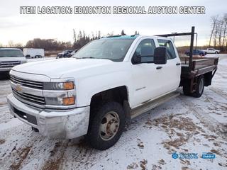 Fort Saskatchewan Location -  2015 Chevrolet Silverado 3500HD Crew Cab 4x4 Flat Deck c/w 6.0L V8, A/T, 9 Ft. 6 In. X 8 Ft. Deck, Goose Neck Hitch And LT235/80R17 Tires. Showing 144,057kms. VIN 1GB4KYCG3FF116385 *Note: Engine Light Is On, Some Rust On Body* *PL#120*