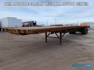 High River Location - 2009 Fontaine 48ft T/A Deck Trailer c/w Air Ride Susp., Sliding Susp., 11R22.5 Tires, VIN 13N1482C691549848. Current Safety