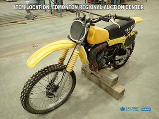 Fort Saskatchewan Location - 1978 Yamaha 123cc Engine YZ125 Motor Bike, 3.00-21 Front Tire And 4.10-18 Rear Tire. VIN 2X3004101 *Note: No Compression In Kick Start, Torn Seat, Running Condition Unknown* 