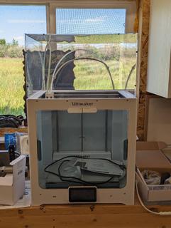 Selling Off Site Aldersyde, AB - 2018 Ultimaker B.V. S5 3D Printer, Top cover not included. 330 x 240 x 300mm Build Area, 20 Micron Layer Resolution, 280*C Max Print Temperature, Heated Build Plate, Touch Display, Glass Doors For Air Control, 100 - 240VAC, 6A, 60Hz, SN BPP-012628-052394.  Call 403-988-8882 for viewing options.