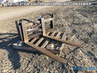 High River Location - Set Of Hydraulic Skid Steer Forks, 4in x 48in (Requires Repair)