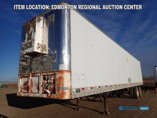 Fort Saskatchewan Location - Fruehauf Canada Inc. Model FB9-F2W61-14M-10Z T/A Van Trailer, C/w Side Door, Shelving Unit w/ Contents And 8 Ft. X 3 Ft. 4 In. Work Table, Spring Susp, 285/75R24.5 Tires. VIN 2H8V04625GS057001 *Note: Rust And Dents On Body, No Locks, No Latch On Back Door*