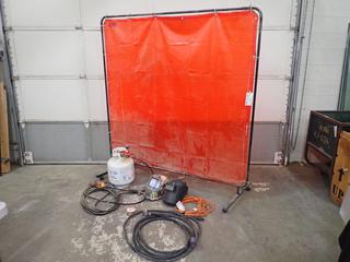 68 In. x 67 In. Portable Welding Curtain c/w 600V 3 Prong HD Extension Cable, Tiger Torch w/ 20lb Propane Tank, (2) Welding Helmets, Lincoln 0.025 In. Mig Wire, and Extension Cord **Note: Buyer Responsible For Load Out, Located Offsite @ 493 Sioux Road,  Sherwood Park, AB, For More Details Contact 780-944-9144**