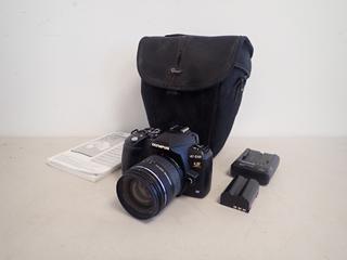 Olympus E-510 Digital Camera SN D62541903 c/w (1) Battery, Battery Charger, Case and Manual **Note: Buyer Responsible For Load Out, Located Offsite @ 493 Sioux Road,  Sherwood Park, AB, For More Details Contact 780-944-9144**