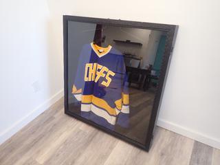41 In. x 39 In. x 4 In. Display Case w/ Chiefs Jersey Size Adult Large **Note: Buyer Responsible For Load Out, Located Offsite @ 493 Sioux Road,  Sherwood Park, AB, For More Details Contact 780-944-9144**