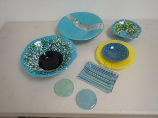 (1) 10 1/2 In. and (1) 10 In. "Wendy McPeak" Original Locally Made Decorative Glass Art Bowls c/w (1) 7 In. Decorative Glass Art Bowl Piece, (2) 3 1/8 In. Glass Coasters and (1) 6 In. x 4 In. Plate **Note: Buyer Responsible For Load Out, Located Offsite @ 493 Sioux Road,  Sherwood Park, AB, For More Details Contact 780-944-9144**