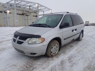 2005 Dodge Caravan c/w 3.3L V6, A/T And 215/70R15 Tires. Showing 295,731kms. VIN 1D4GP25R75B122754 *Note: Missing (2) Seats, Rust On Body, Flat Tires*
