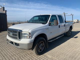 2006 Ford F350 XLT 4x4 Crew Cab Pickup c/w 6.0L Power Stroke, Auto, A/C, Fold Up Steel Cargo Shelf, Erickson Truck Rack, Louvered Tailgate, 275/70R18 Tires, Showing 208249 KMs, VIN 1FTWW31PX6EB59660 *Note: Cracked Block* (HIGH RIVER YARD)