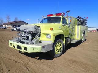 1987 Ford F800 4X2 Superior Emergency Equipment Fire Truck c/w 7.0L 429 Lima V8 Manual Transmission, Hale P75-4 Water Pump, Superior Emergency Equipment 14ft. X 6ft. X 4 1/2ft. Tank (11) Storage Boxes, 188in Wheel Base And 10.00-20 Tires. Showing 6350kms And 0731hrs. SN SE876. VIN 1FDPF82K6HVA29622  (FORT SASKATCHEWAN YARD)