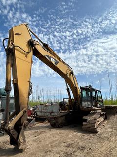 2003 Caterpillar 345B Excavator c/w Model 3176 439hp 10.3L Diesel. Showing 12,441hrs. PIN CAT0345BCAGS01720 *Note: Runs, Has Hydraulic Leak, Some Track Pads Broken And Mismatched, Front Window Cracked, Buyer Responsible For Loadout* **THIS ITEM IS LOCATED @ 1 SUNSET BOULEVARD**