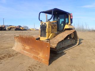 2012 Caterpillar D6N LGP Crawler Tractor c/w 6-way Dozer, A/C Cab, Sweeps, Rear Screen, 33 3/4in Single Bar Grouser Pads, PACCAR 50BPS-E0 Winch. Showing 13,528hrs, 27,539kms. SN PBA00475