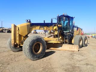 2012 Caterpillar 14M Grader c/w C11 296hp Diesel Engine, AC/Heater, 100in MS Ripper, 16ft Mold Board And 20.5R25 Tires. Showing 38,083hrs, 36,559kms. PIN CAT0014MVR9J01040 *Note; Glass Cracked In Door, Engine Door Panel Damaged*
