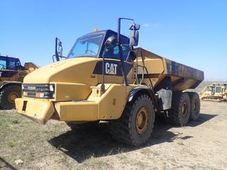 2012 Caterpillar 730 Articulated Dump Truck c/w C11 319hp Diesel Engine, 3-Spd, Backup Camera, Heated Box And 750/65R25 Tires. Showing 19,731hrs. PIN CAT00730JB1M03933 *Note: Bumper Damaged*