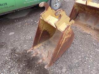 CAT 24in Excavator Bucket. SN 36473 *Note: Damaged* **THIS ITEM IS LOCATED @ 1 SUNSET BOULEVARD**