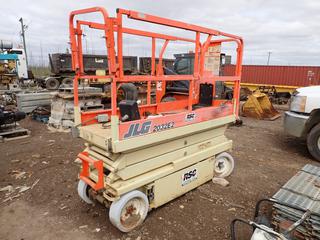 2000 JLG 2032-E2 750lb Cap. Electric Scissor Lift c/w 20ft Max Height. SN 0200069575 *Note: Running Condition Unknown* **THIS ITEM IS LOCATED @ 1 SUNSET BOULEVARD**