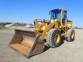 1998 John Deere 624H 4WD Wheel Loader c/w 3-Spd, AC/Heater, WBM 101in Bucket And 20.5R25 Tires. Showing 795hrs, 5397kms. PIN DW624HX567618 *Note: Front Tire Pass Side Cracked Around Wheel Well* (LOCATED IN EDSON)