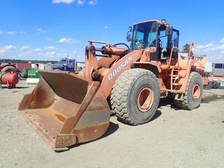 2006 Doosan Mega400V-Super Wheel Loader c/w 10 1/2ft Bucket And 26.5R25 Tires. PIN DHKHLSY0V5000336 *Note: Running Condition Unknown, Needs Radiator, Fan And Parts Installed* (LOCATED IN EDSON)