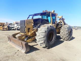 2000 Tiger Cat 630B 4x4 Grapple Skidder c/w Cummins C8.3-A Diesel, 9 1/2ft Piling Blade, Dual Arch Grapple And DH35.5L-32 Tires w/ 1 Pair of Tire Chains. Showing 7379hrs. SN 6301249 (LOCATED IN EDSON)